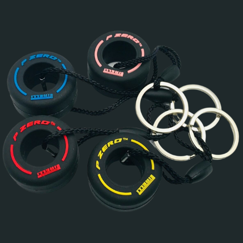 Pirelli P Zero tire keychains in blue, red, pink, yellow from revnhaus