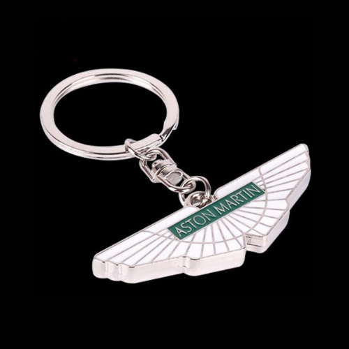 Aston Martin wing logo keychain with green enamel text, silver metal finish from revnhaus