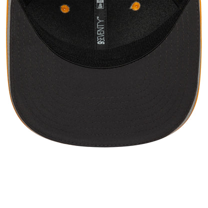 Black cap with orange stitching and J LINDEBERG tag from revnhaus