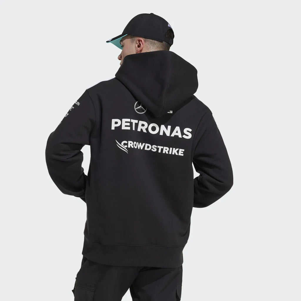 Black Petronas Mercedes F1 hoodie with CrowdStrike logo, worn with cap from revnhaus