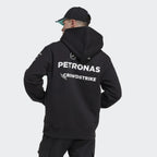 Black Petronas Mercedes F1 hoodie with CrowdStrike logo, worn with cap from revnhaus