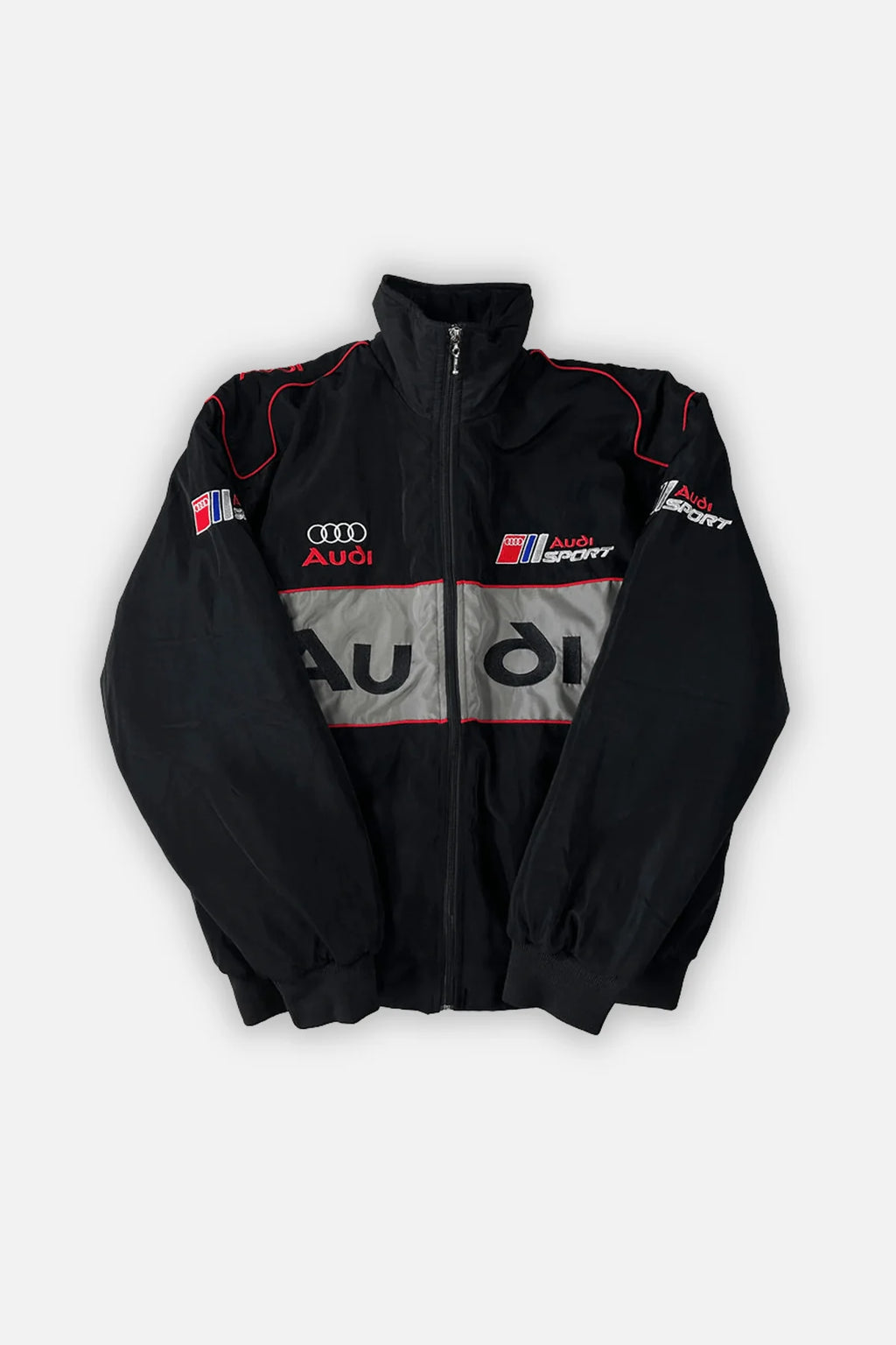 Black Audi Sport racing jacket with red trim and logo details from revnhaus