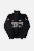 Black Audi Sport racing jacket with red trim and logo details from revnhaus