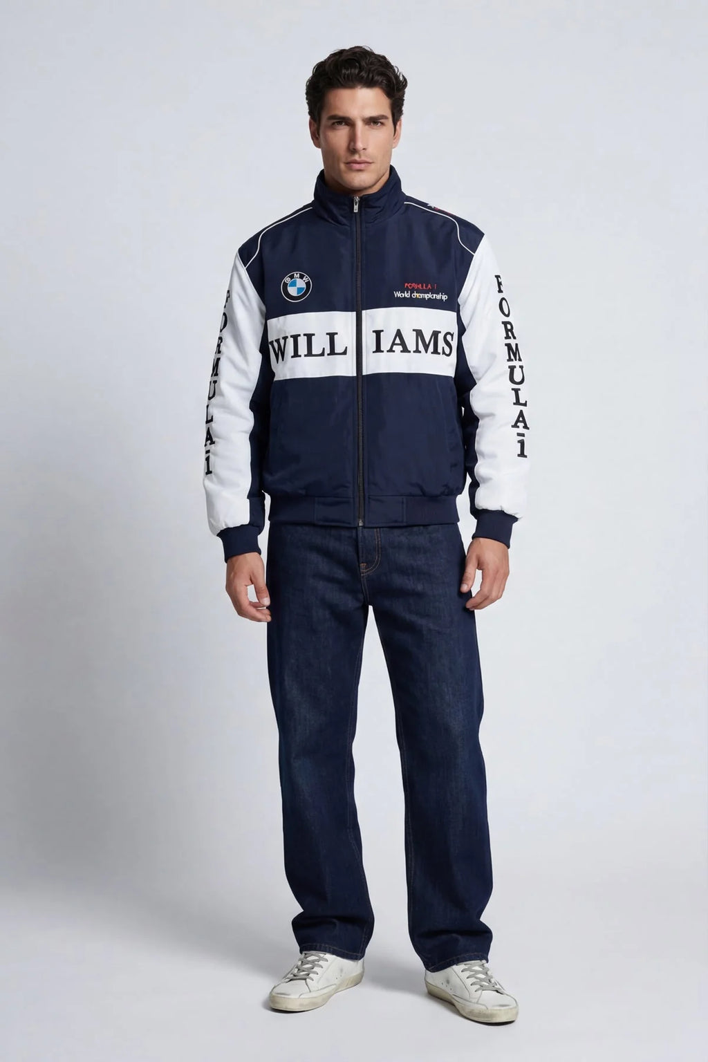 Men's navy and white Williams F1 racing jacket with BMW logo, styled with jeans and sneakers from revnhaus