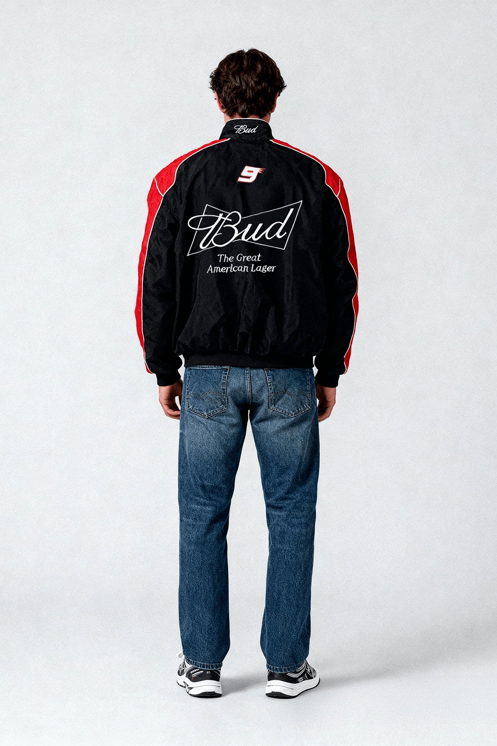 Black and red racing jacket with Bud logo and number 9 on back, worn with jeans from revnhaus