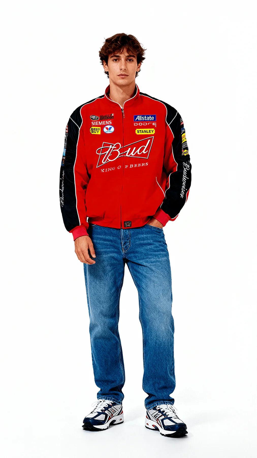 Red Budweiser racing jacket with sponsor logos, worn with jeans and sneakers from revnhaus