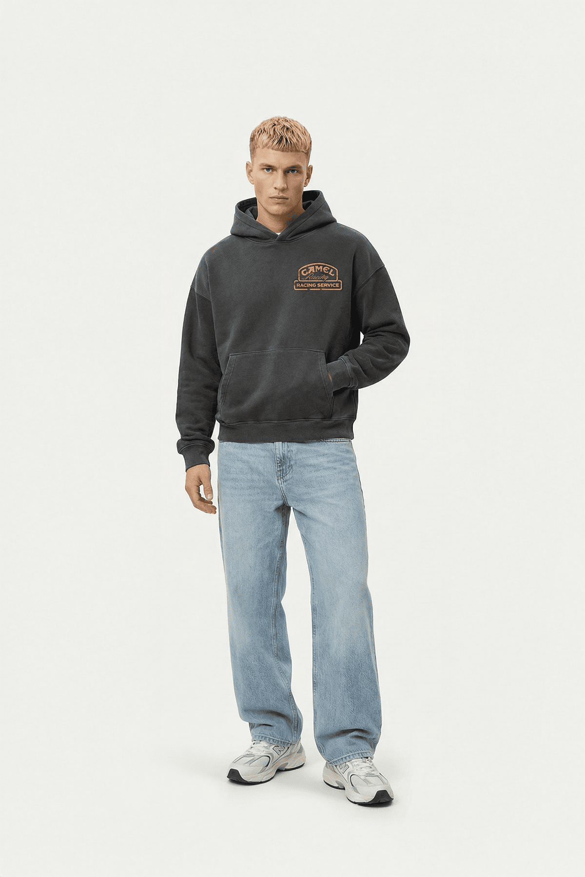 Men's dark gray racing hoodie with Camel Racing Service logo, styled with light jeans from revnhaus