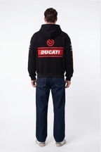 Black Ducati hoodie with red logo and racing graphics on back, worn with jeans from revnhaus