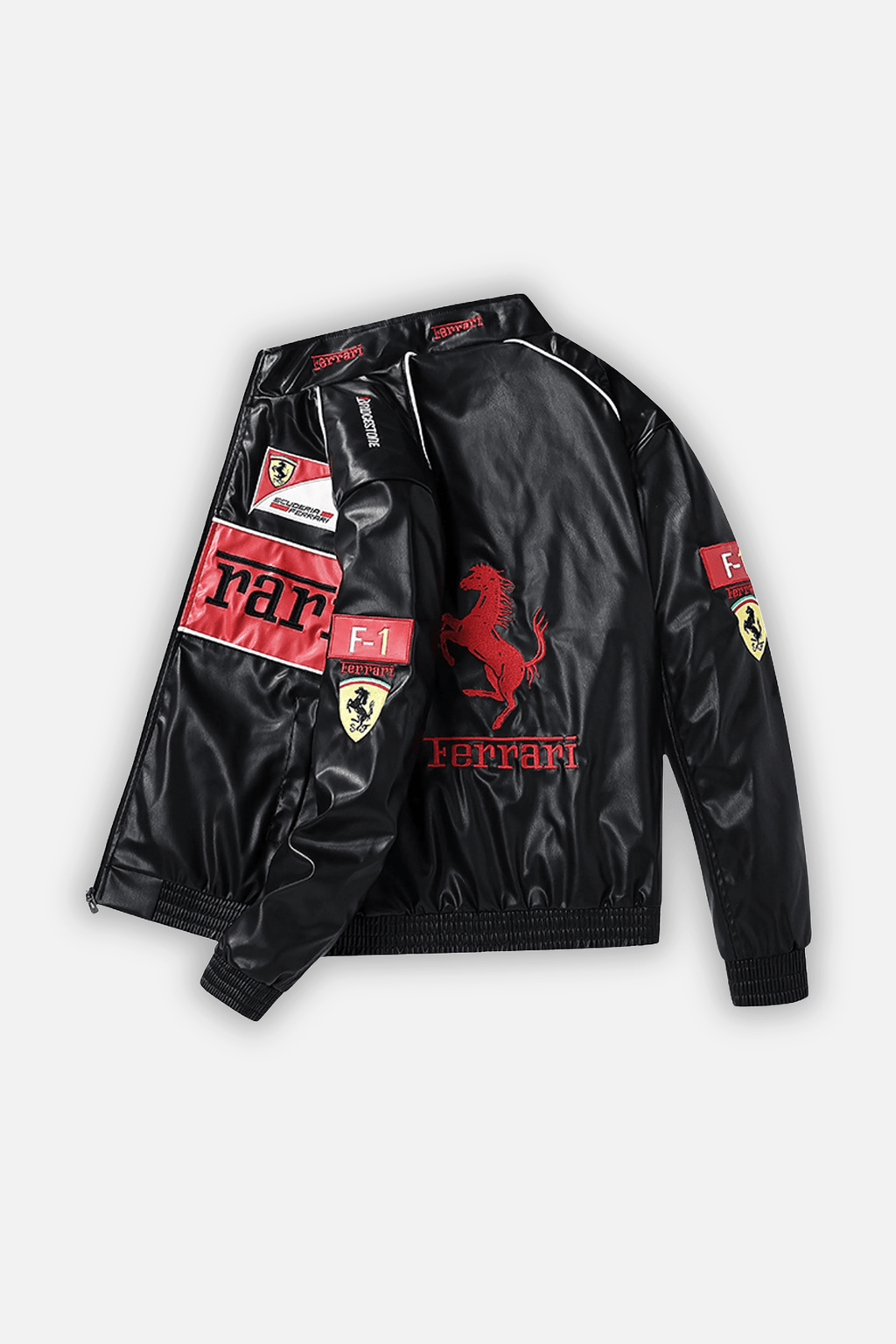 Black Ferrari F1 racing jacket with red prancing horse logo and Scuderia patches from revnhaus