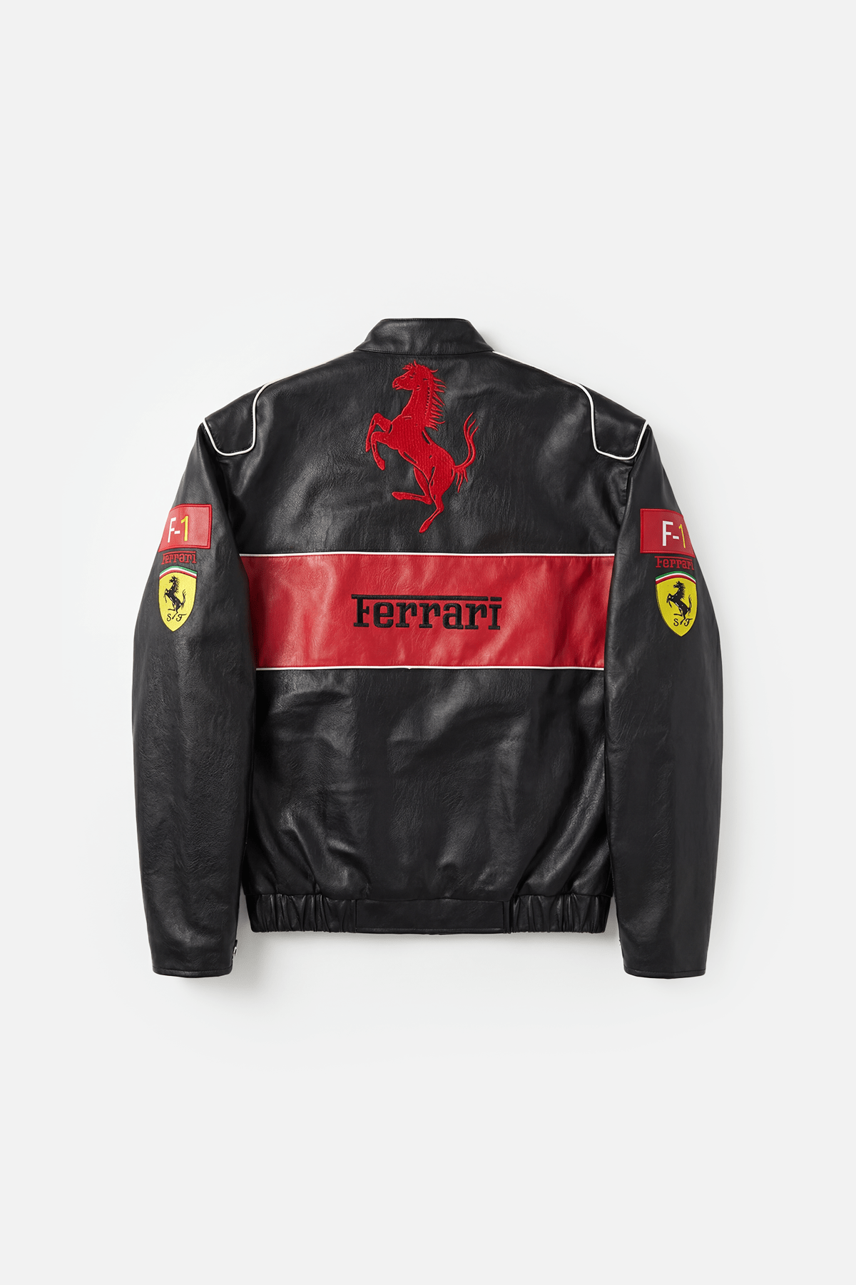 Black Ferrari racing jacket with red prancing horse, F1 logos, and stripe detail from revnhaus