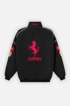 Black Ferrari racing jacket with red prancing horse logo and sleeve patches from revnhaus