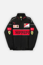Black Ferrari F1 racing jacket with red accents, Shell and UPS logos, from revnhaus