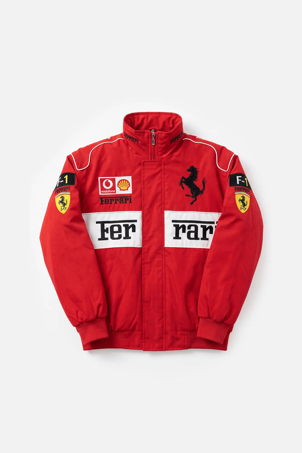 Red Ferrari F1 racing jacket with Vodafone and Shell logos, prancing horse emblem, from revnhaus