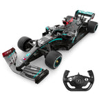 Remote-controlled Formula 1 race car with detailed branding and steering wheel controller from revnhaus