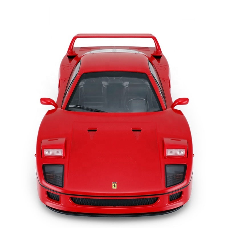 Red Ferrari F40 die-cast model car with rear wing and iconic prancing horse emblem from revnhaus