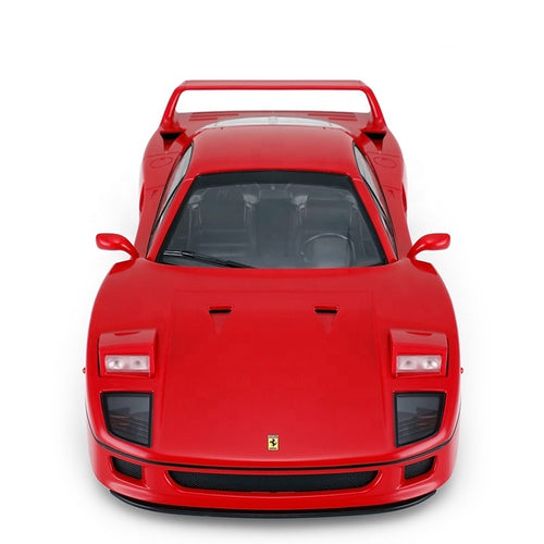 Red Ferrari F40 die-cast model car with rear wing and iconic prancing horse emblem from revnhaus
