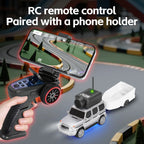 RC remote control with phone holder for FPV racing, paired with silver drift car from revnhaus