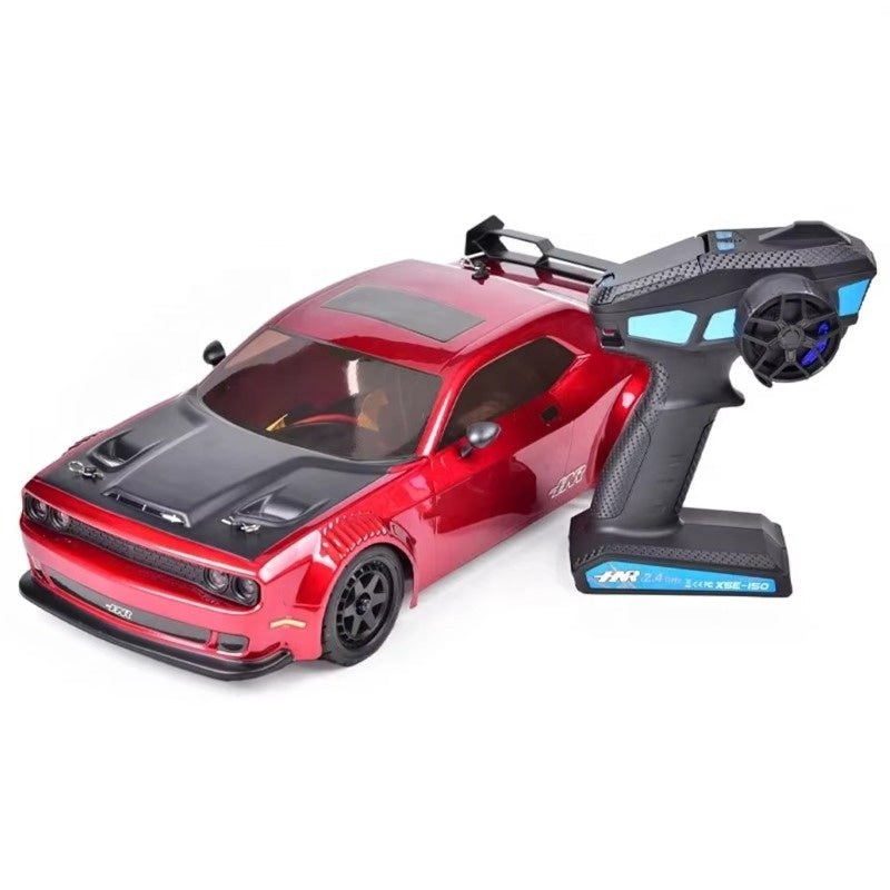 Red RC drift car with black hood and remote control from revnhaus