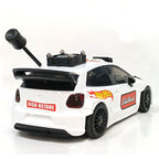 White RC drift car with Hot Wheels and Edelbrock decals, rear spoiler, and exhaust pipe from revnhaus