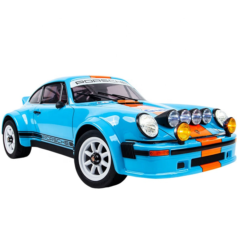 Blue Porsche rally car die-cast model with orange stripes and racing lights from revnhaus