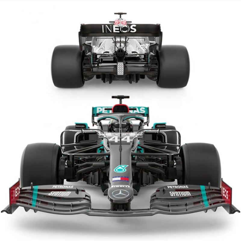 Mercedes-AMG F1 W14 race car front and rear views, INEOS & PETRONAS branding, from revnhaus