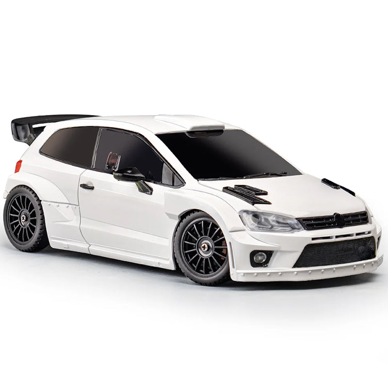 White RC drift car with black rims and rear wing, die-cast collectible from revnhaus