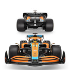 McLaren Artura Formula 1 race car with orange and blue livery from revnhaus