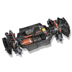 High-performance RC drift car chassis with detailed suspension and motor, from revnhaus