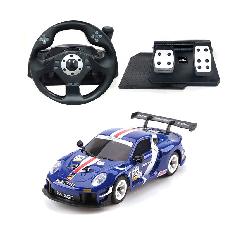 Blue RC drift car with racing decals, steering wheel, and pedal set from revnhaus