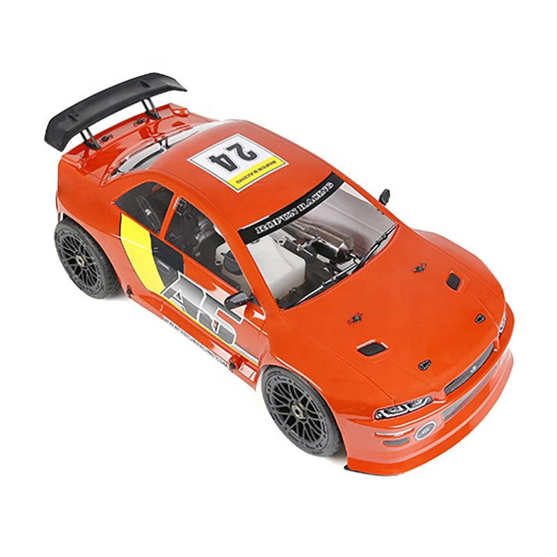 Orange RC drift car with racing decals and rear wing from revnhaus