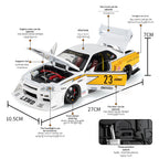 White and yellow RC drift car with opening doors, hood, trunk, and working lights from revnhaus