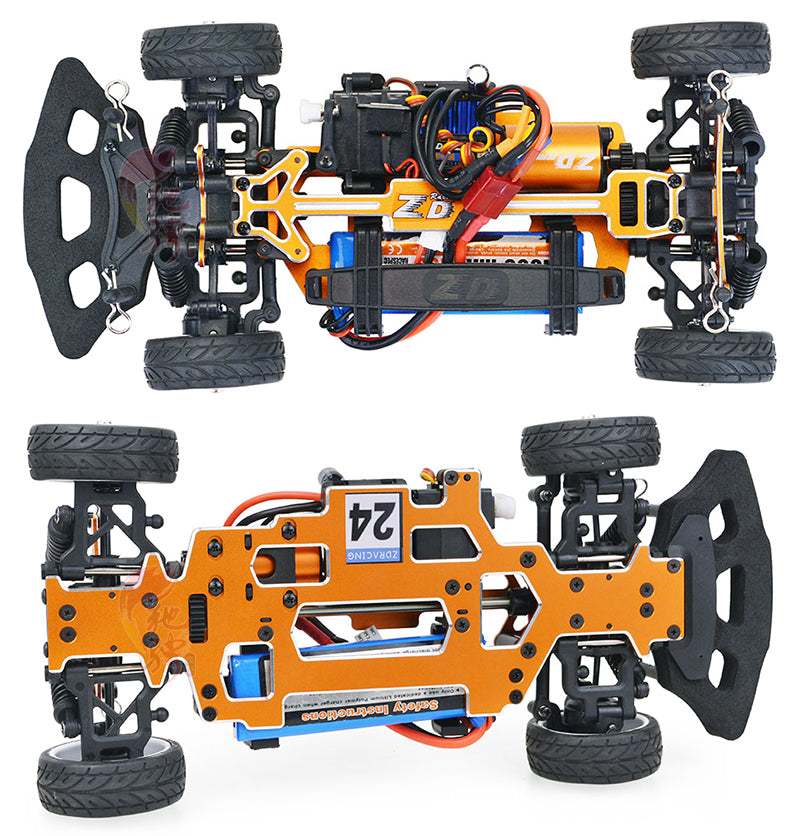 Orange RC drift car chassis with exposed electronics and suspension, from revnhaus