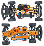 Orange RC drift car chassis with exposed electronics and suspension, from revnhaus