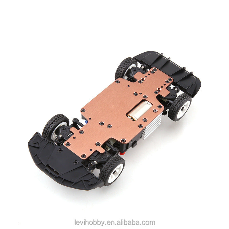 RC drift car chassis with copper plate and battery, from revnhaus