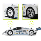 White RC drift car with RLAARLO 203 livery, detailed wheels and decals from revnhaus