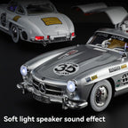 Silver Mercedes 300 SL die-cast model with racing decals, light & sound effects from revnhaus