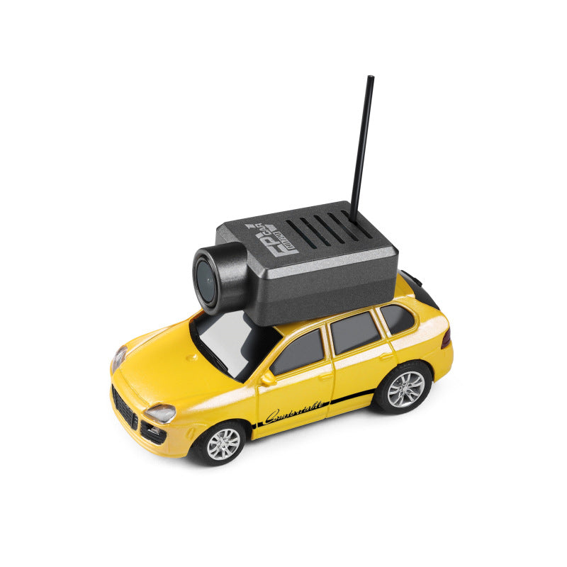 Yellow Porsche Cayenne die-cast RC car with FPV camera and antenna from revnhaus