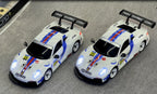 White RC drift cars with blue red stripes, LED lights, and racing decals from revnhaus