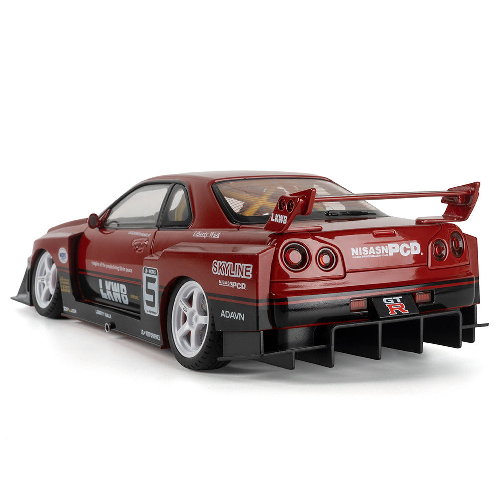 Red Nissan Skyline GT-R die-cast model with Liberty Walk body kit and racing decals from revnhaus