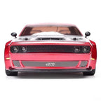 Red RC drift car with black grille and HR badge, front view from revnhaus