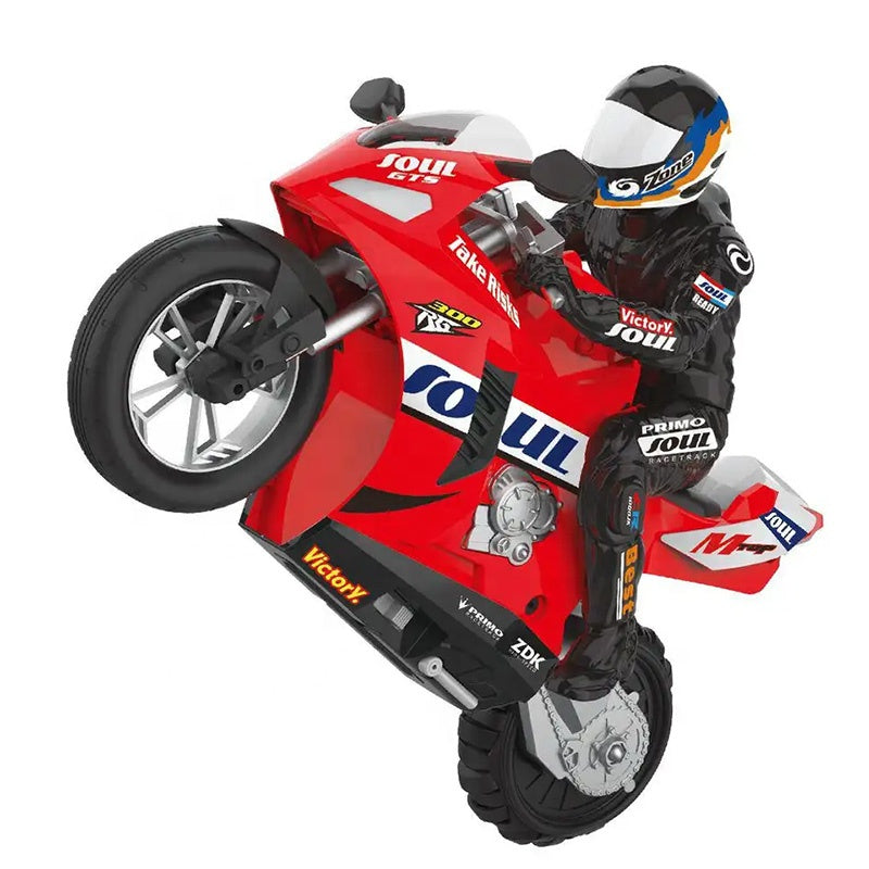 Red SOUL GTS RC motorcycle with rider in racing gear, die-cast collectible from revnhaus