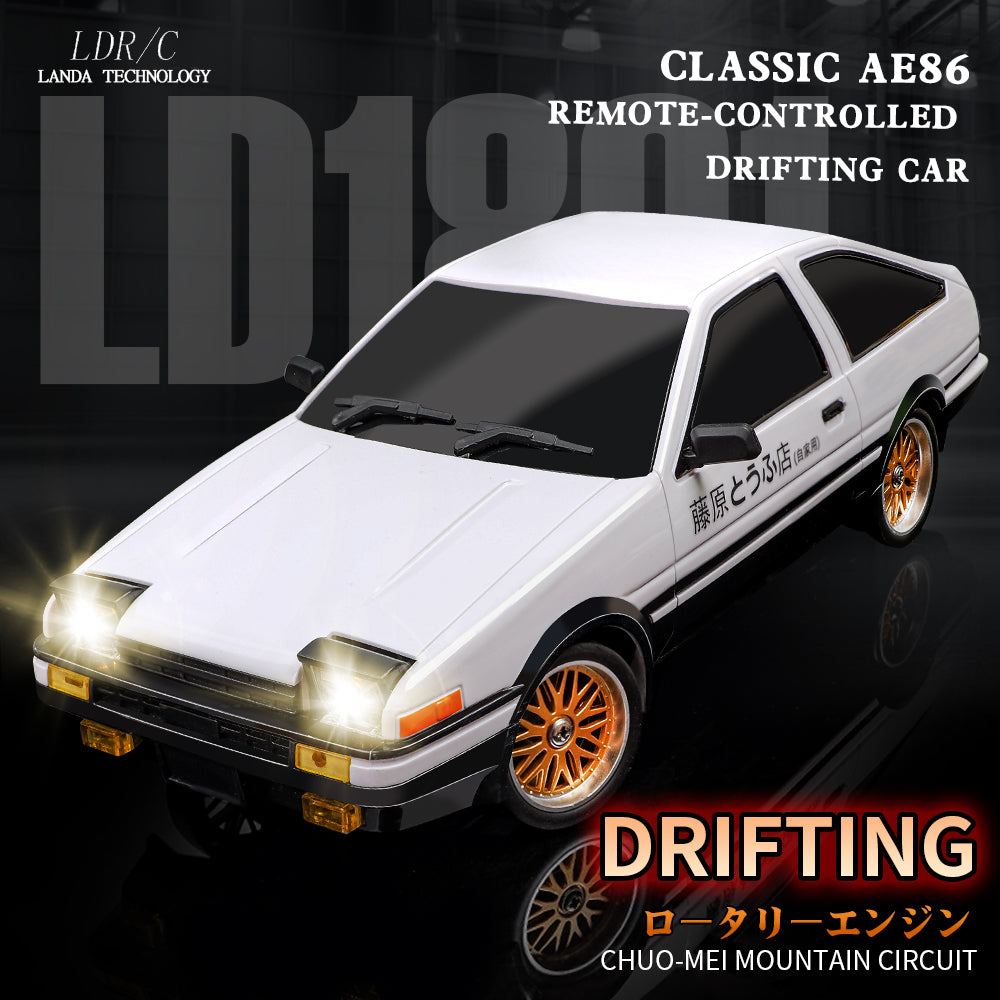 White AE86 remote-controlled drifting car with gold rims, headlights on, from revnhaus