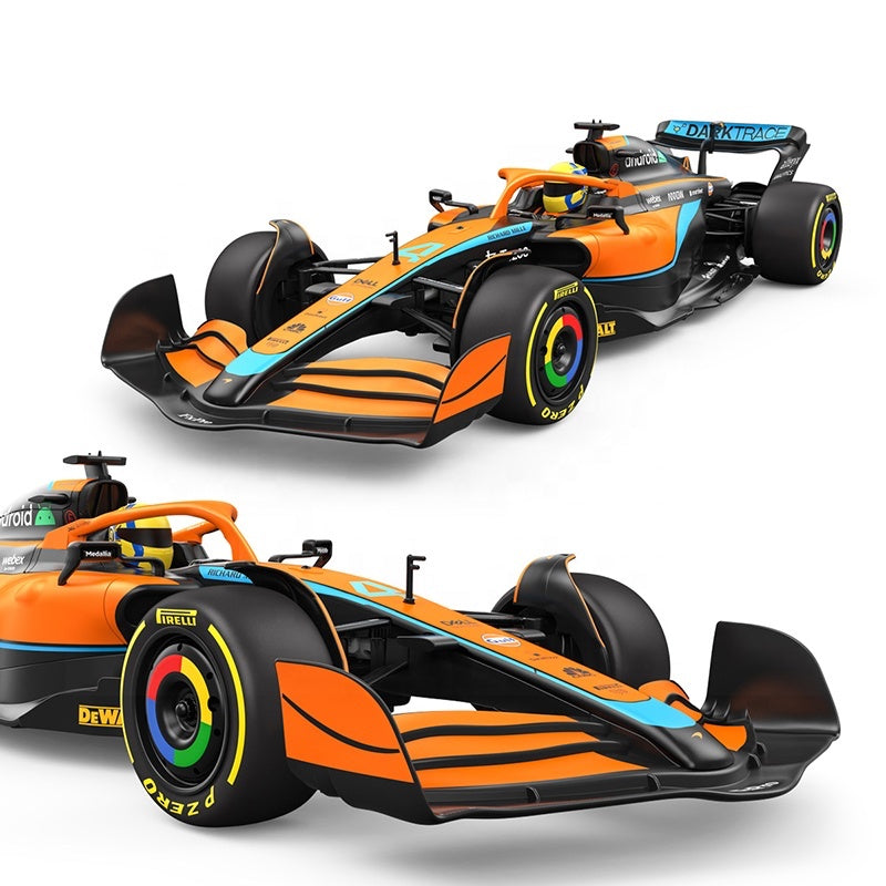 Orange and black Formula 1 race car with Pirelli tires from revnhaus