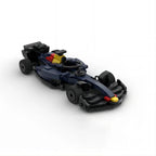 Blue and black F1 race car model with red and yellow accents from revnhaus