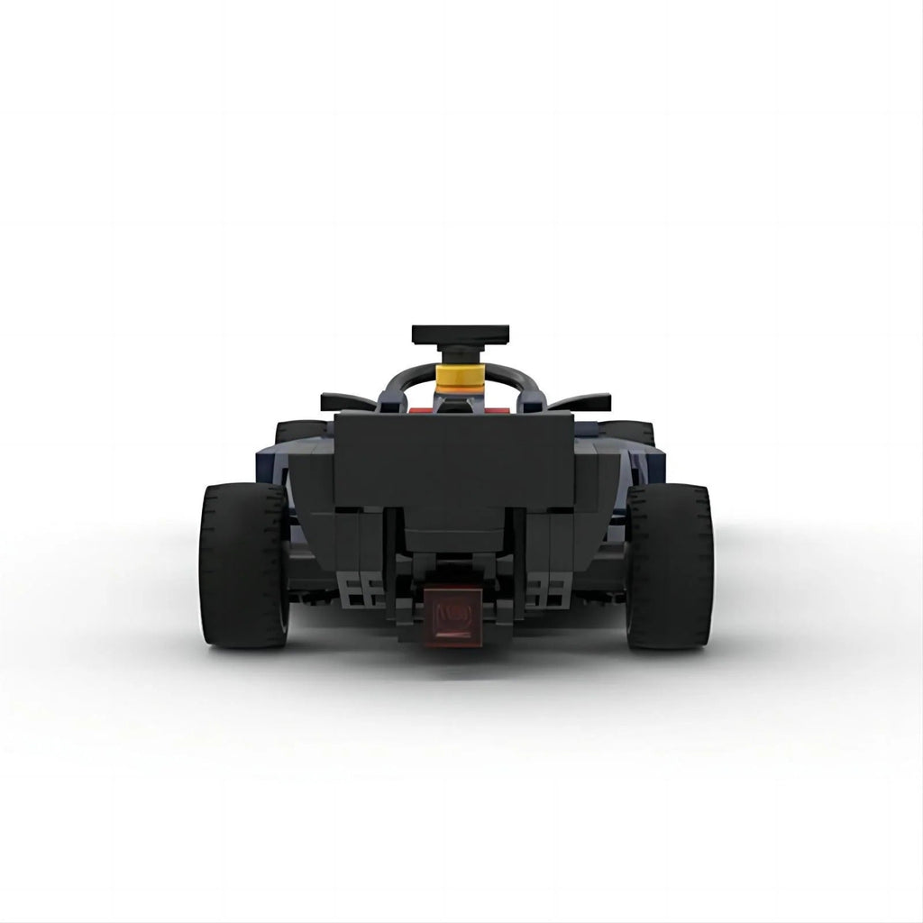 Black LEGO-style F1 race car with rear wing and wide tires from revnhaus