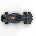 Top view of a detailed F1 race car model with red and yellow accents from revnhaus