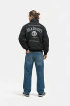 Black Jack Daniel's racing jacket with Old No.7 logo, worn with jeans, from revnhaus
