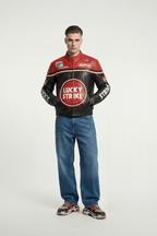 Men's Lucky Strike racing leather jacket with Michelin and Motul logos, styled with jeans from revnhaus