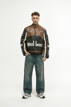 Marlboro racing jacket with Michelin and Aral patches, styled with jeans and sneakers from revnhaus