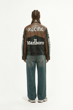 Brown and black racing leather jacket with Marlboro logo, worn by model from revnhaus